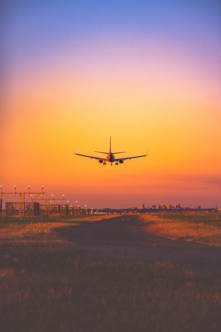 Airplane spotting, a flight ready to land on the airport. Seen from beneath the plane, with a beauti